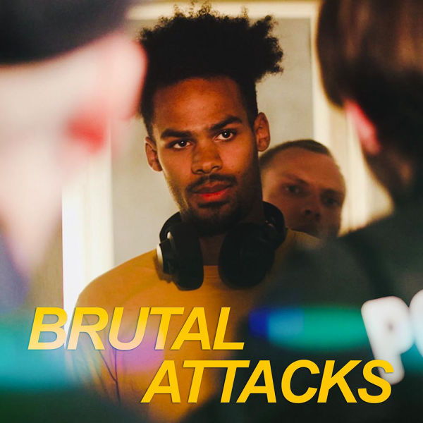 Cover image for the song 'Brutal Attacks' featuring a young man with headphones around his neck, standing in a crowded room. The song title 'Brutal Attacks' is displayed in bold yellow capital letters.
