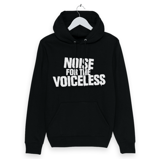 Black hoodie featuring the 'Noise For The Voiceless' logo in bold, distressed white capital letters on the chest. The hoodie has a front pocket and adjustable drawstrings.